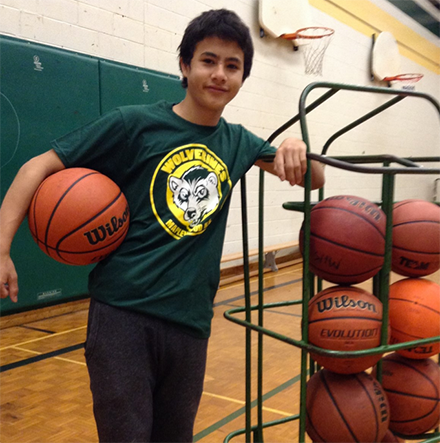 Student Athlete of the year Patrick Carstens from Maplewood HS posing with basketballs.